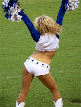 dallas cowboys cheerleader from the back saying goodbye